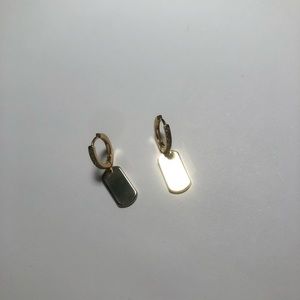 Tag earring from local eclectic